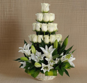 white roses lilies basket